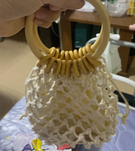 圆环手提包镂空编织包包2021新款潮简约气...