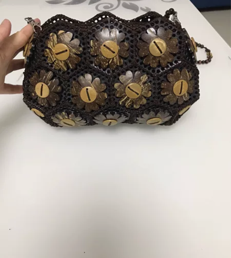 女士贝壳包。以下是两款包：第一款见图一至四...