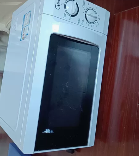 微波炉，七成新。性能良好。 感兴趣的话点“...