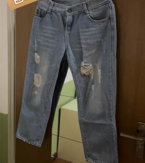 包邮单件包邮破洞浅蓝色牛仔裤均码宽松包邮不...