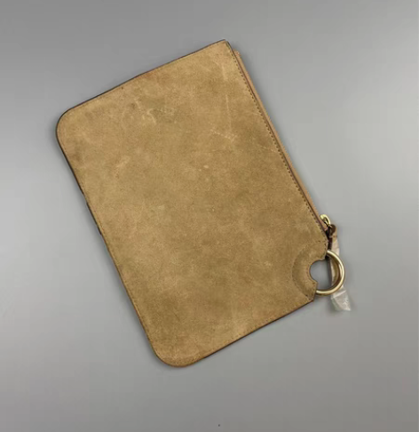 捡漏：翻毛牛皮女士手拿包 瑕疵 主要是压痕...