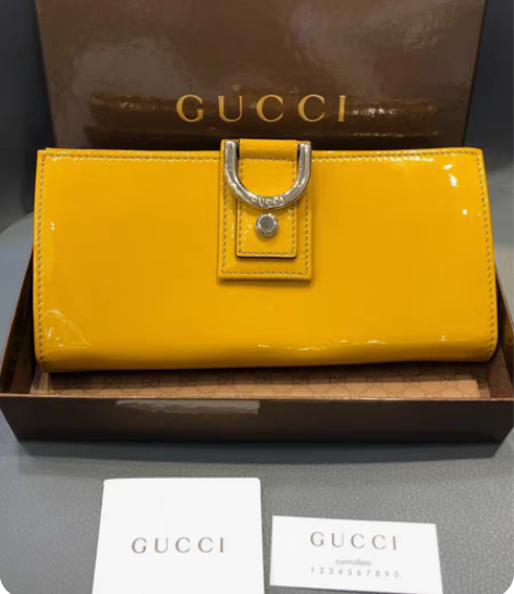 Gucci女士漆皮钱包手拿包、发财漆皮黄色...