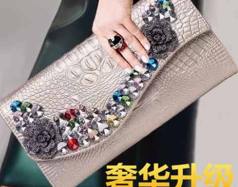 包邮2022新款真皮百搭手拿包女时尚大容量...