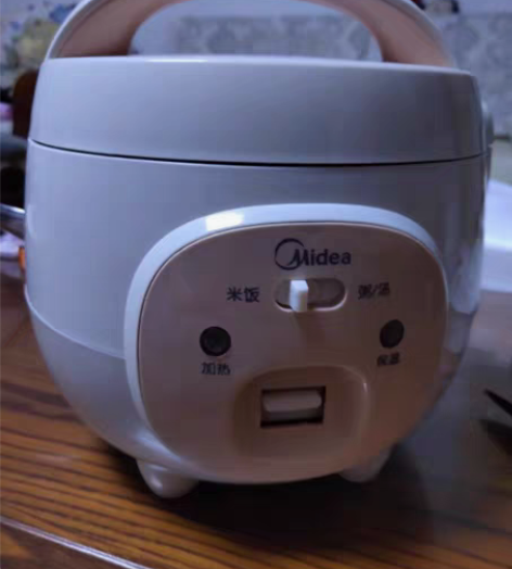 包邮美的（Midea）机械式电饭煲家用1....