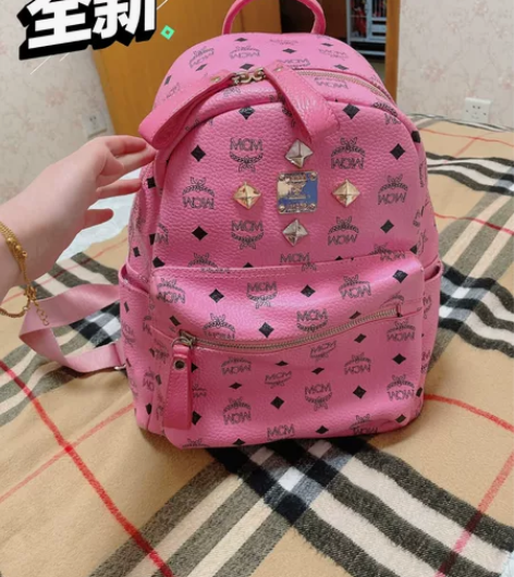 9成新 粉色铆钉双肩包 容量大可以放电脑 ...