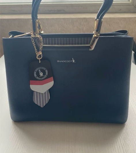 全新袋鼠 女士真皮女包、闲置处理了，拍多有...