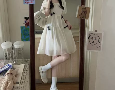森系白色泡泡袖蝴蝶结连衣裙少女设计感小众法...