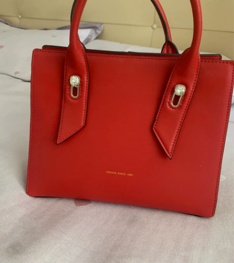 奥康包包，结婚当天使用过一次，基本全新，实...