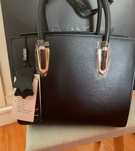 奥康手提包，全新，包装袋子都在，老公600...